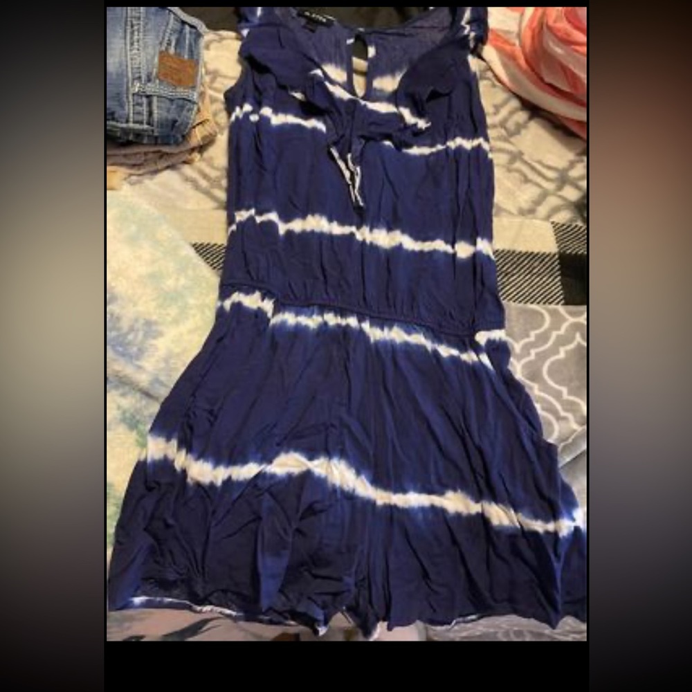 A. byer blue and white romper. size small.